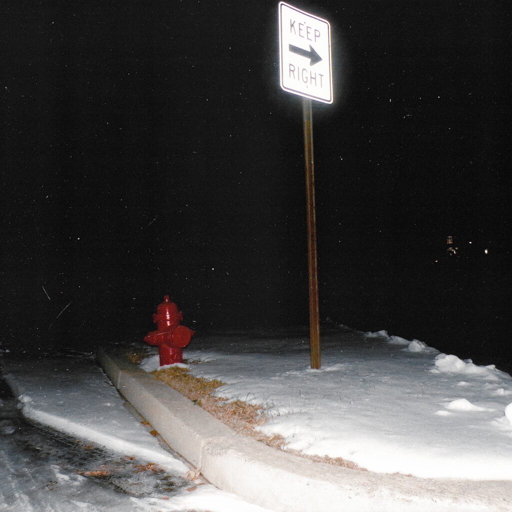 winter-night-fire-hydrant-keep-right-sign